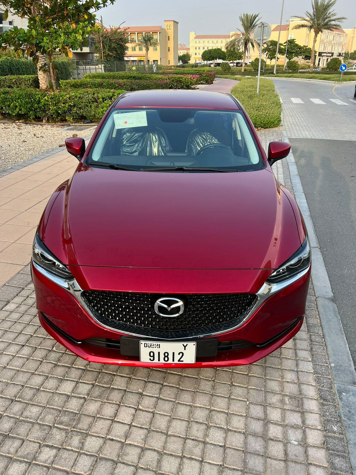 دليل لتأجير السيارات الهجينة والكهربائية في دبي مع الرفاهية